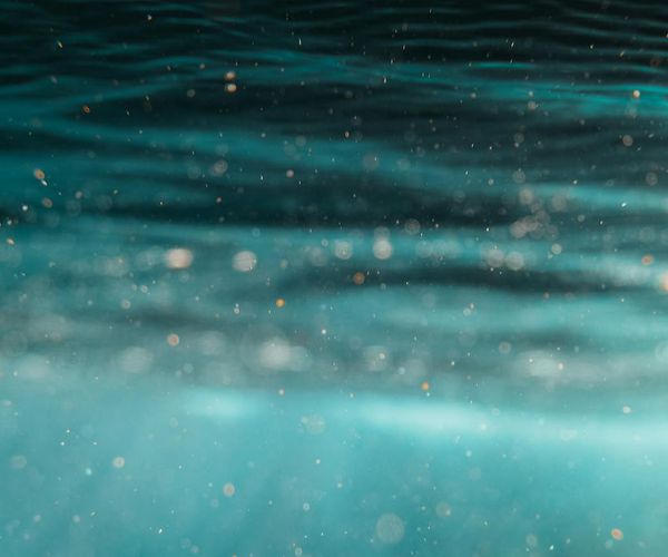 Abstract image showing gentle waves of light, symbolizing calm breathing.